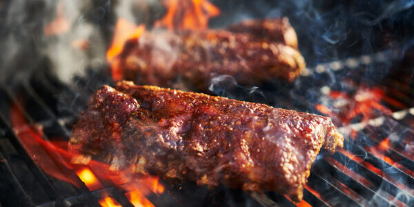 american bbq ribs cooking on grill